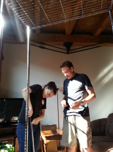 My sister and dad building my giant, extremely useful rolling clothes rack.